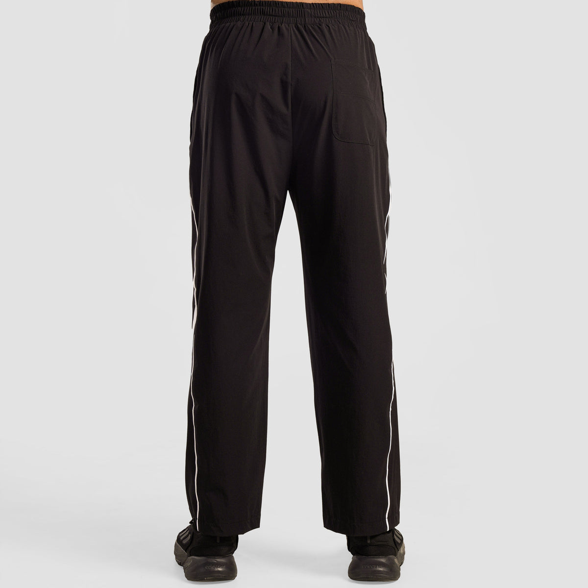 Side angle of Black Dual Stripe Trousers 2.0 for men