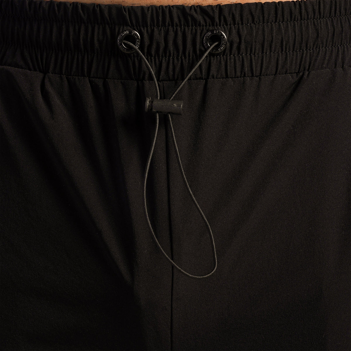 Close-up stitching detail on Black Dual Stripe Trousers 2.0 for men