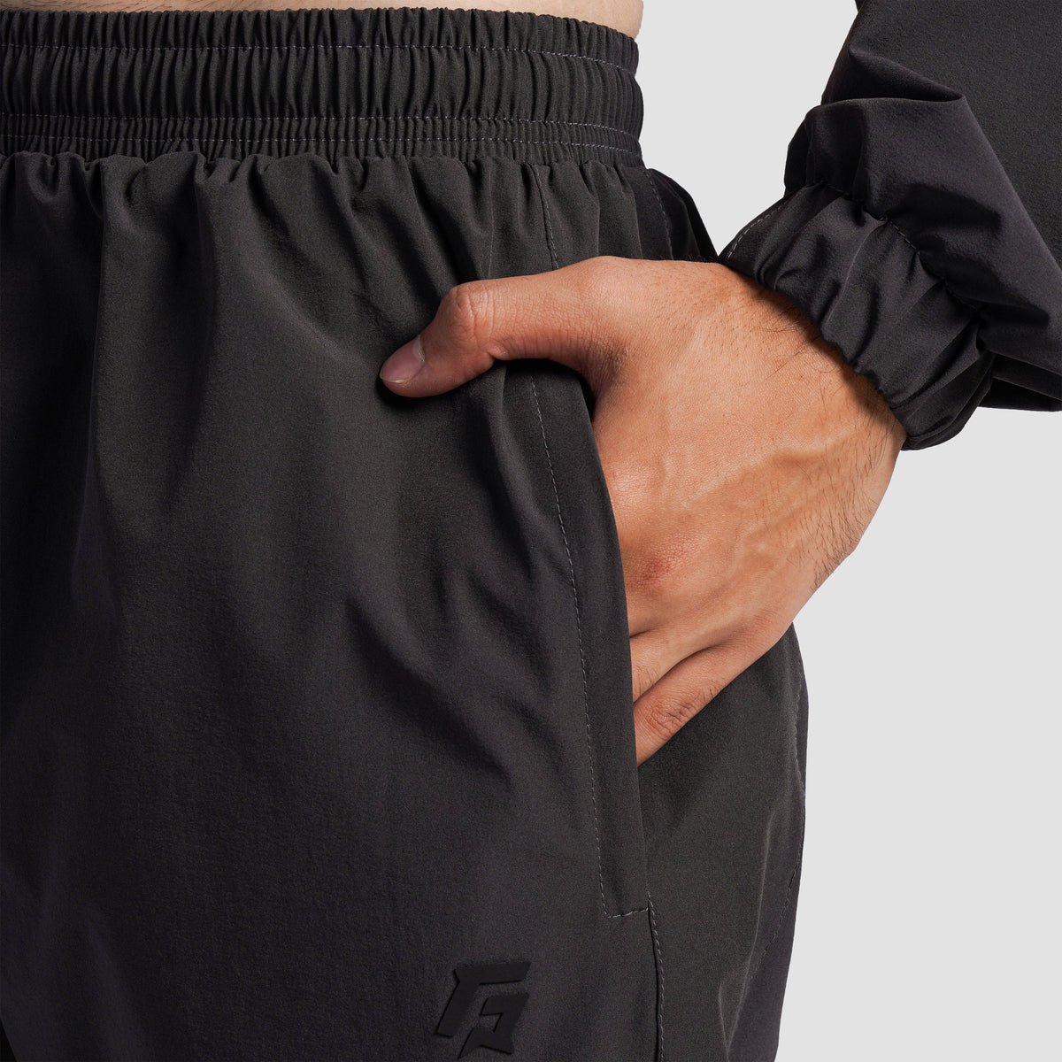 Close-up stitching detail on Charcoal Trackline Joggers for men