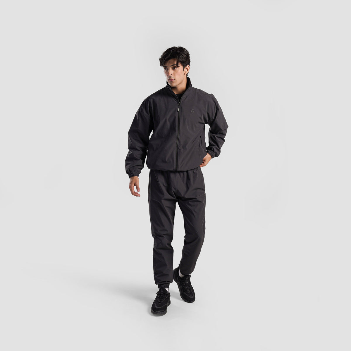 Full-length view of Charcoal Trackline Joggers for men