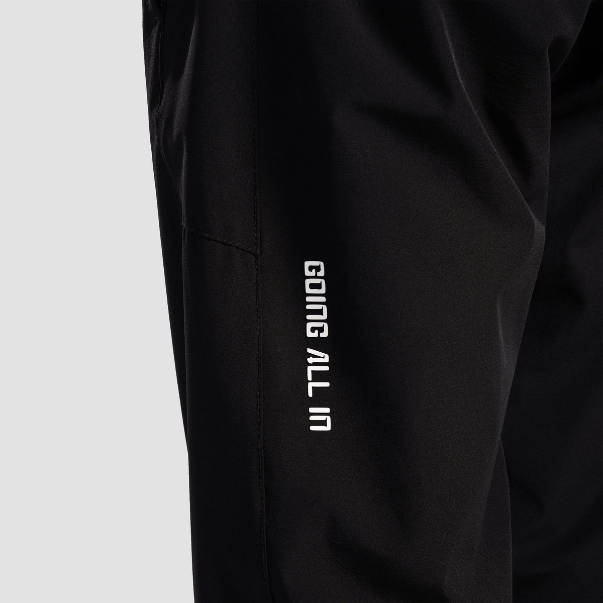 Fabric texture close-up of Black Trackline Joggers for men