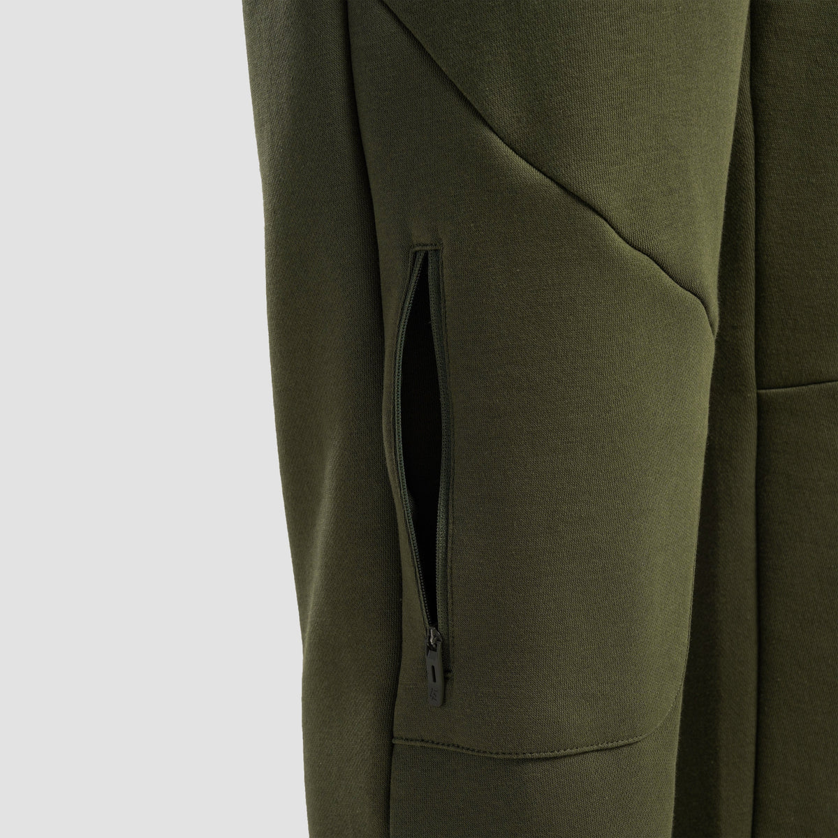 Fabric texture close-up of Olive Axis Strike Trouser for men
