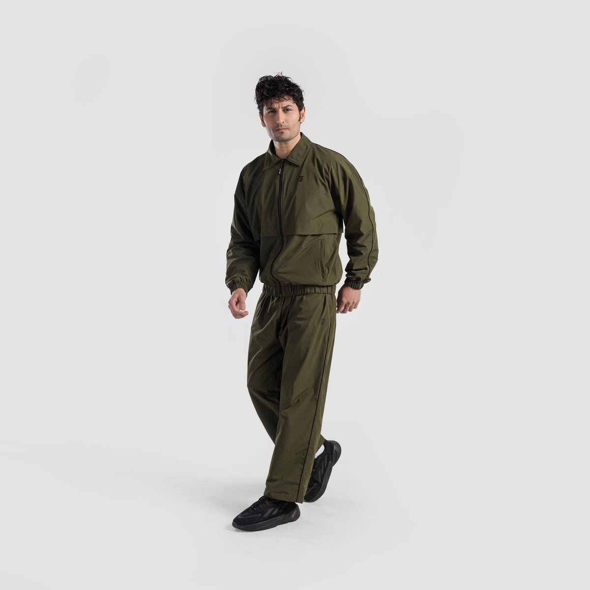 Full-length view of Olive Maxout Track Pants for men