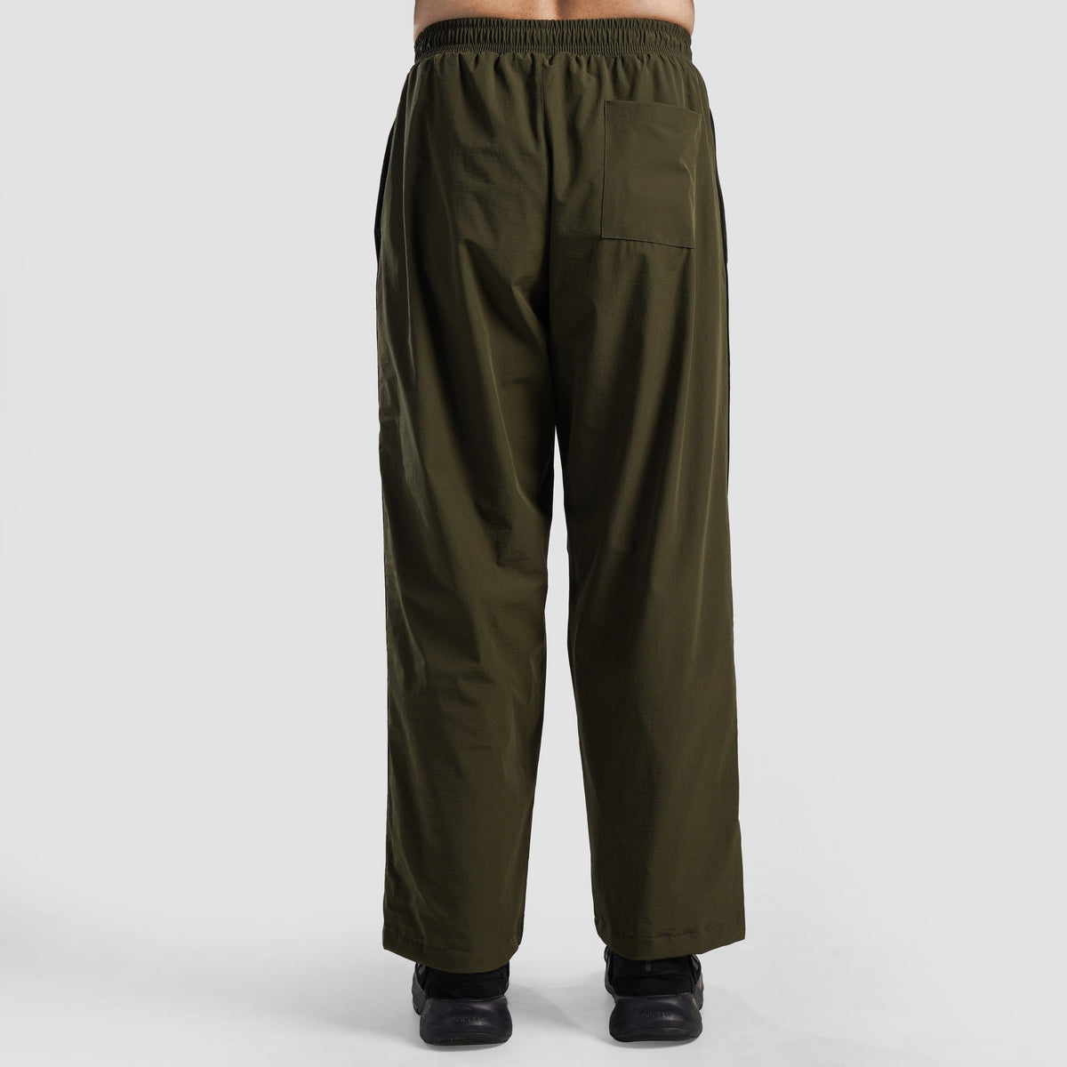 Side angle of Olive Maxout Track Pants for men