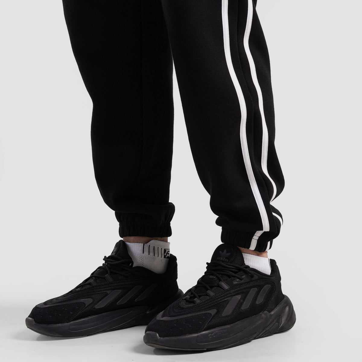 Close-up stitching detail on Black Unstoppable Bottom for men