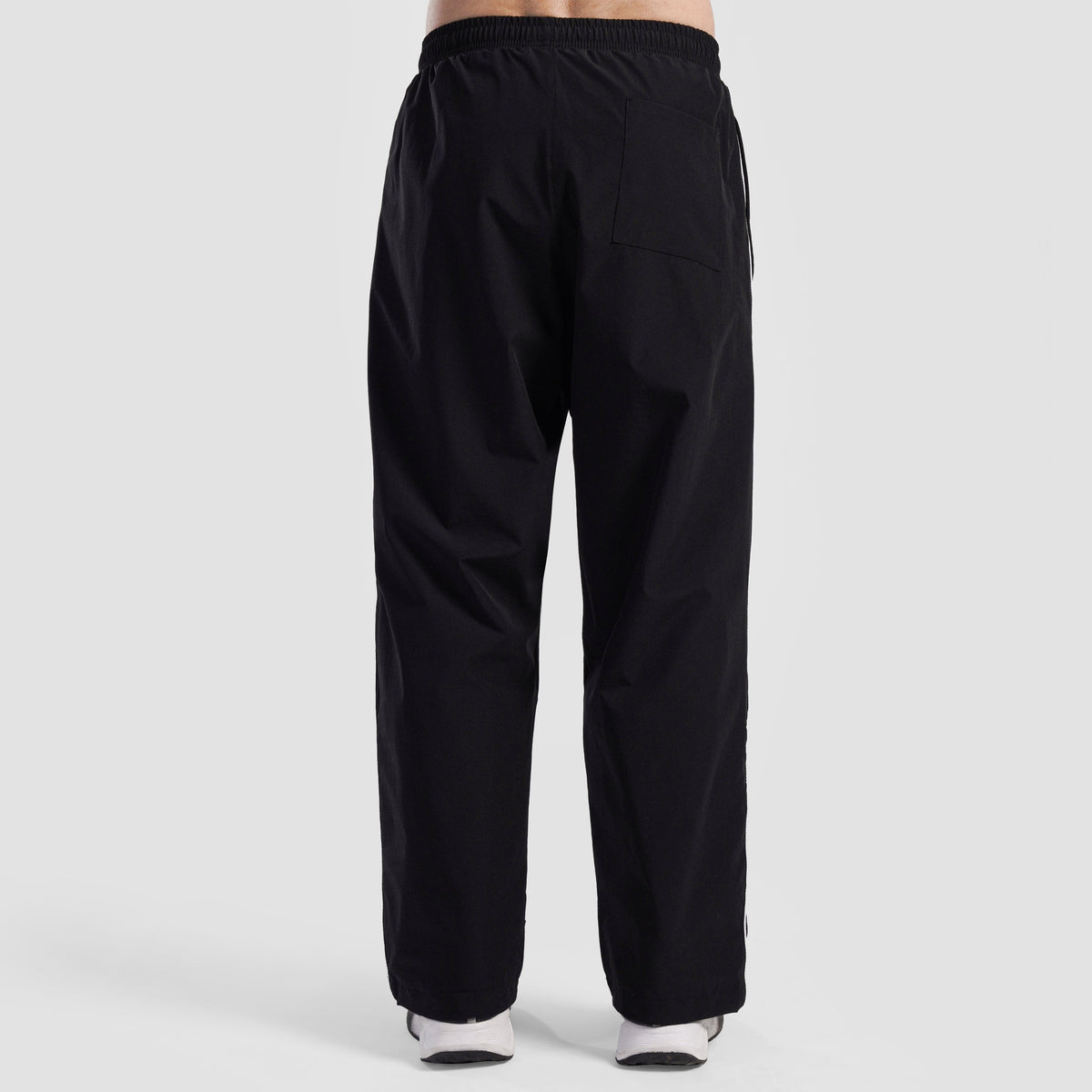 Side angle of Black Maxout Track Pants for men