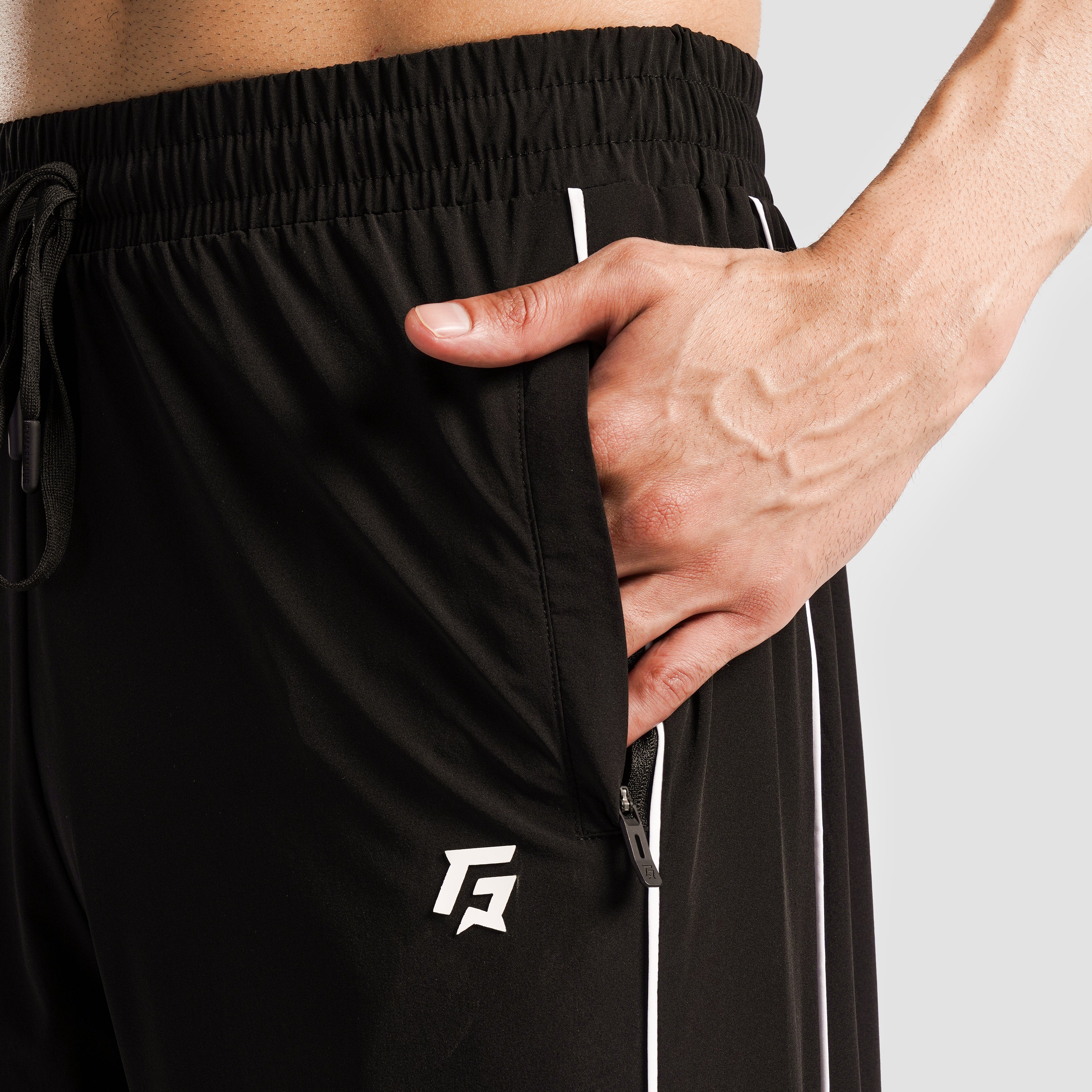 Close-up stitching detail on Black Erecto Stride Trousers for men