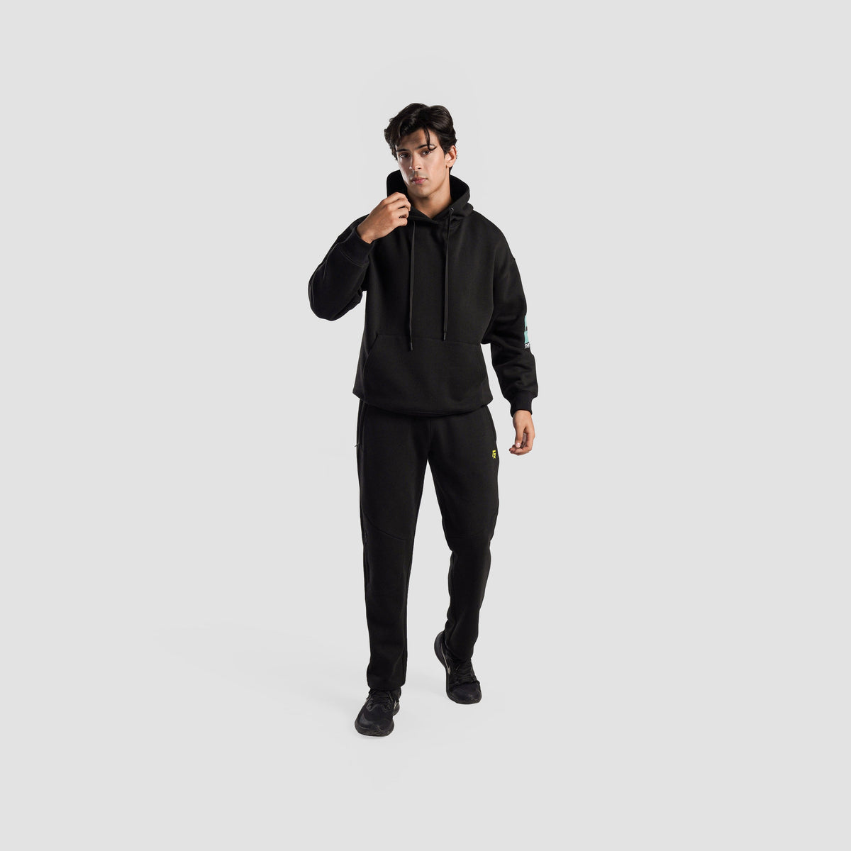 Full-length view of Black Axis Strike Trouser for men
