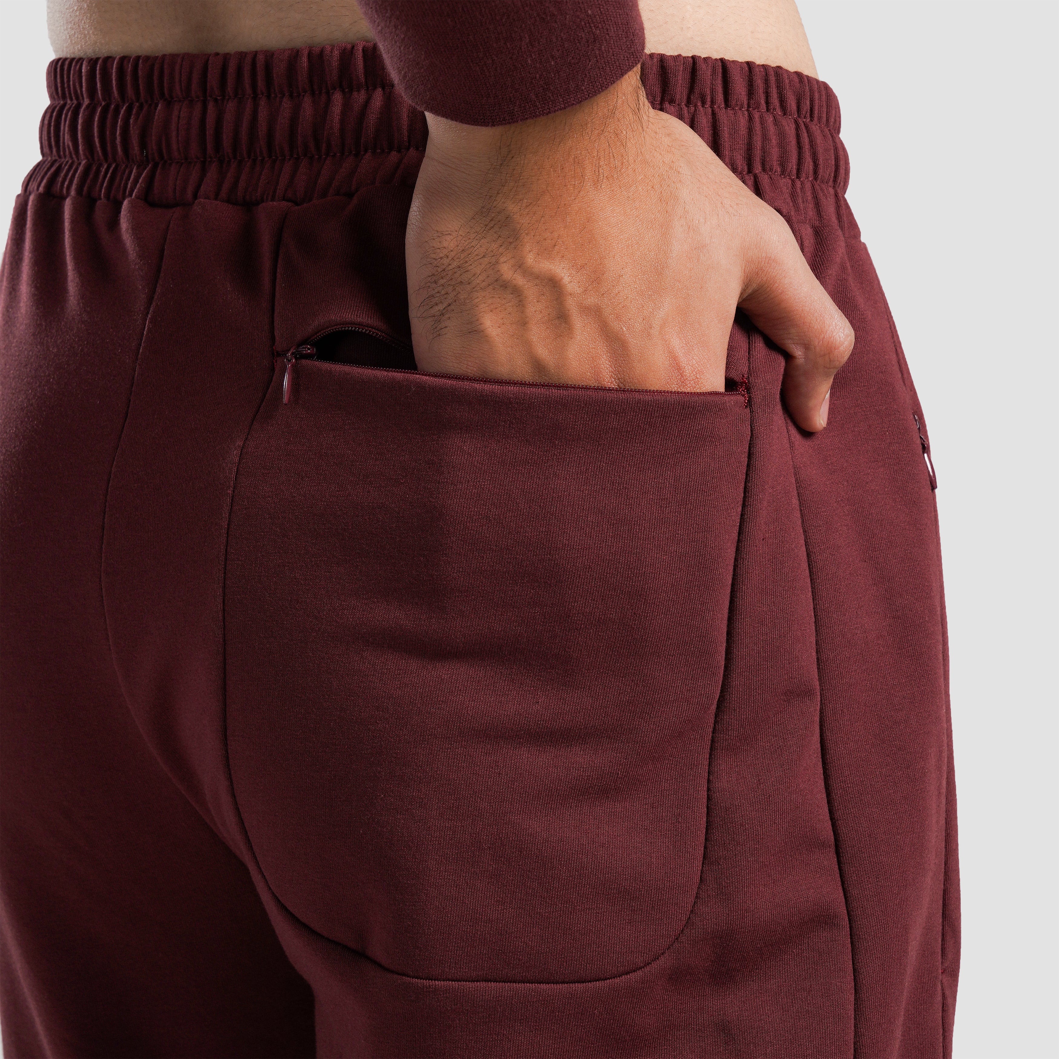 Close-up stitching detail on Maroon Athletic Trousers for men